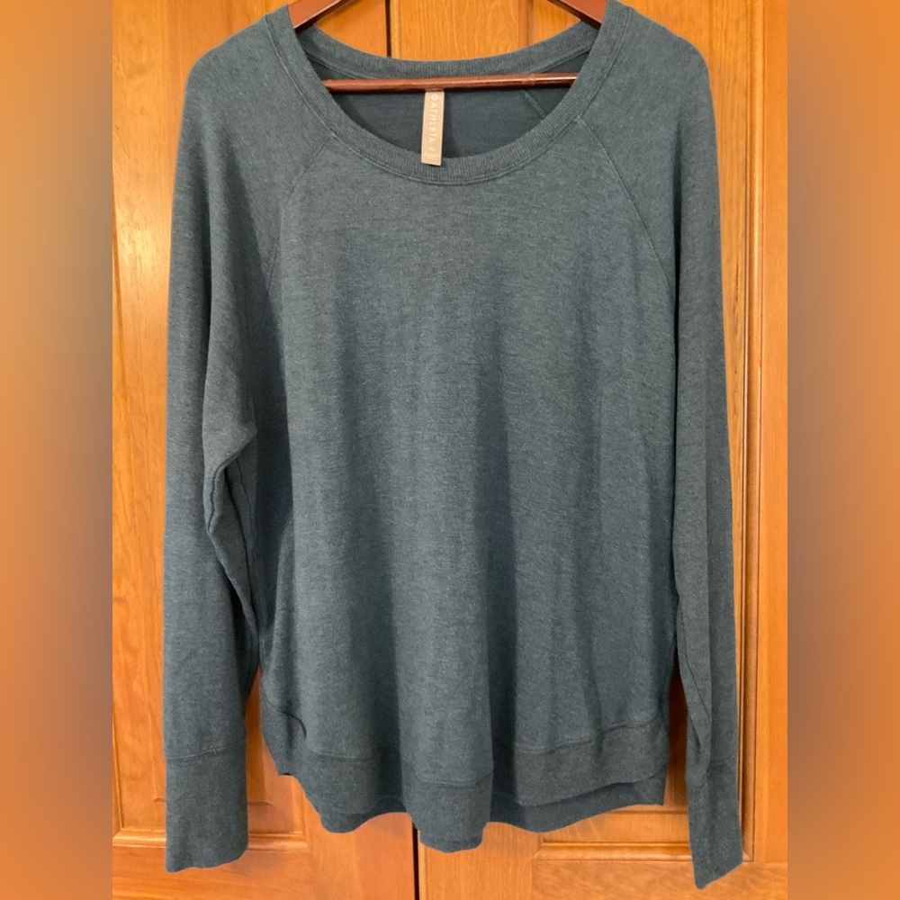 Athleta Move With Ease long sleeve top.
Color:  Maritime (blue)
Size: Regular XL